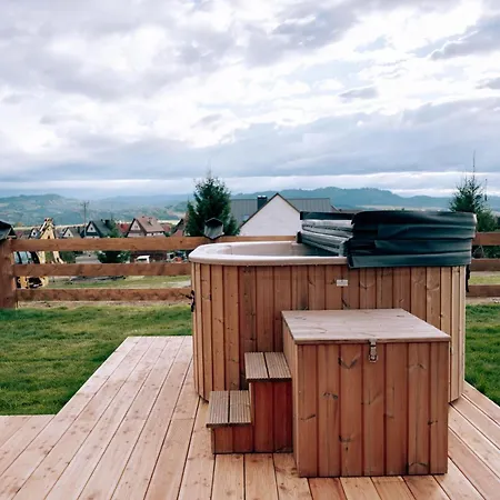 Dom wakacyjny Osada Pod Modrzewiami *