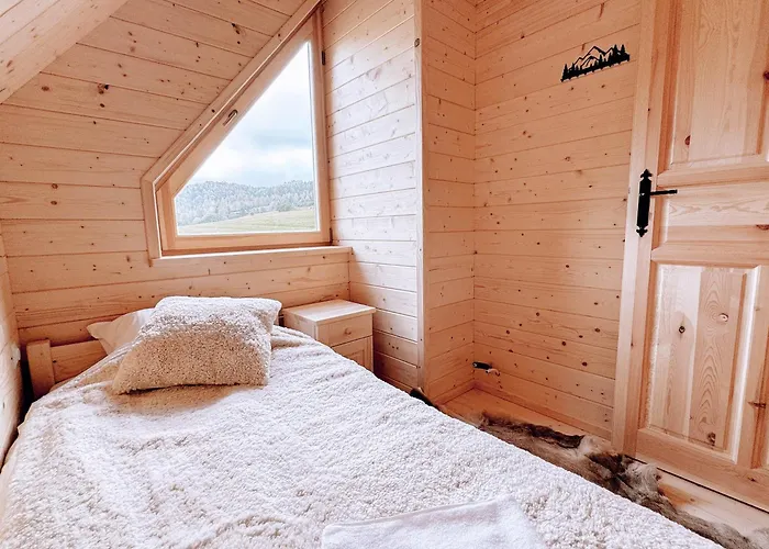 Osada Pod Modrzewiami Feriehus *